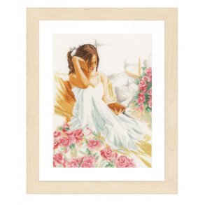 broderipakning - vgbillede - Kvinde der lser