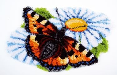 Broderipakning - Rya tppe - Sommerfugl p daisy